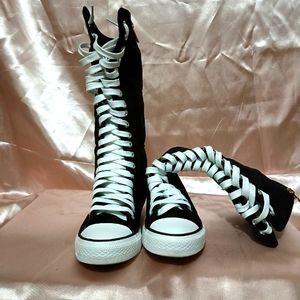 Calf high tennis shoe